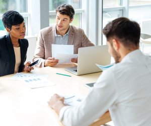 Businesspeople working together on business meeting in conference room