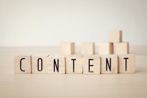 Content word on wooden cubes background