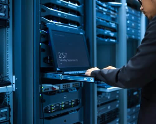 Man fix server network in data center room