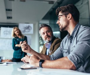 Team of professionals discussing over new business project