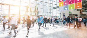 crowd of anonymous business people at a trade show