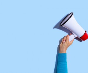 Person holding a megaphone