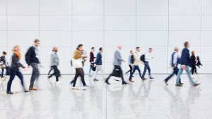 Anonymous crowd of business people on trade fair
